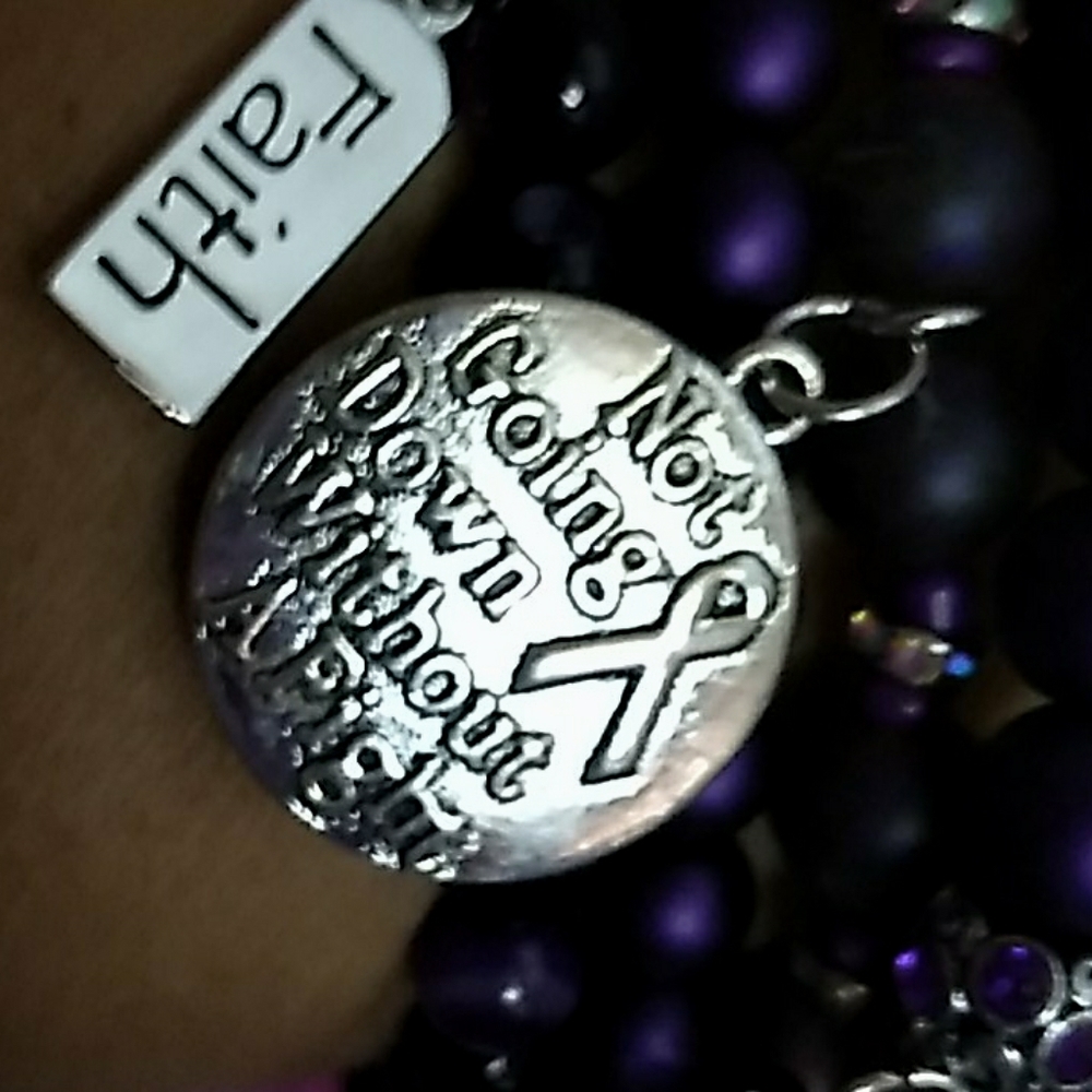 A breast cancer survivor bracelet.